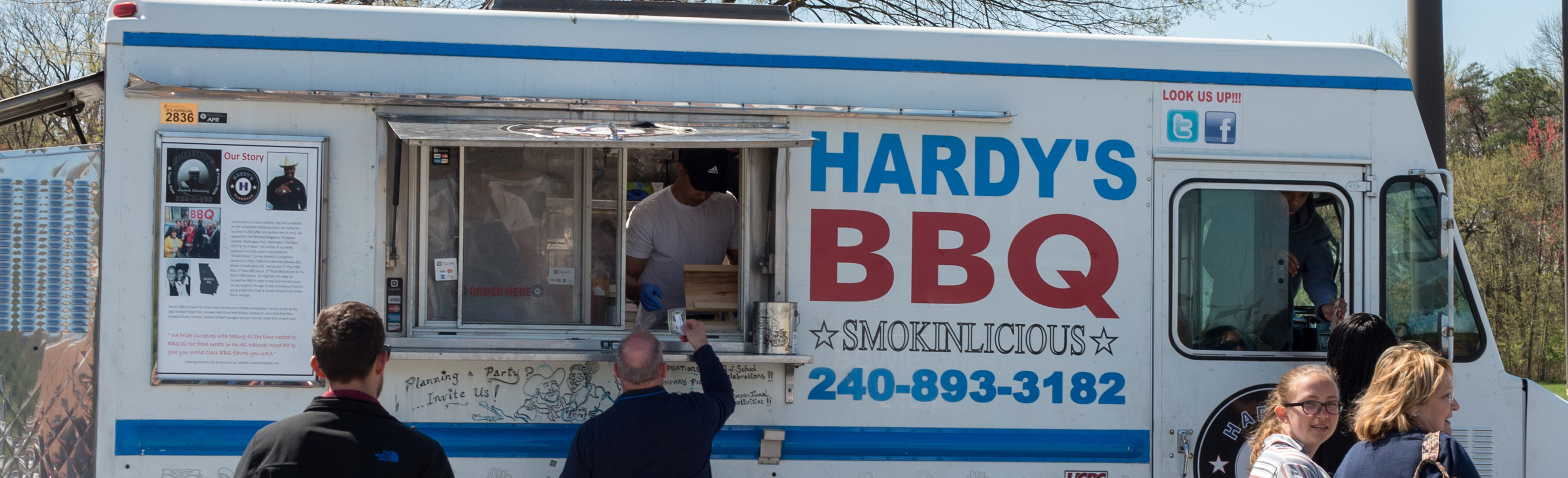 Hardy's BBQ food truck serving customers
